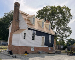 Historic Colonial building reconstruction with modern technology infrastructure.
